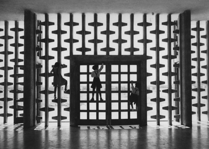 Children climbing a concrete screen, Higher Secondary School, Chandigarh, 1956 designed by Jane Drew (c) RIBA Collections