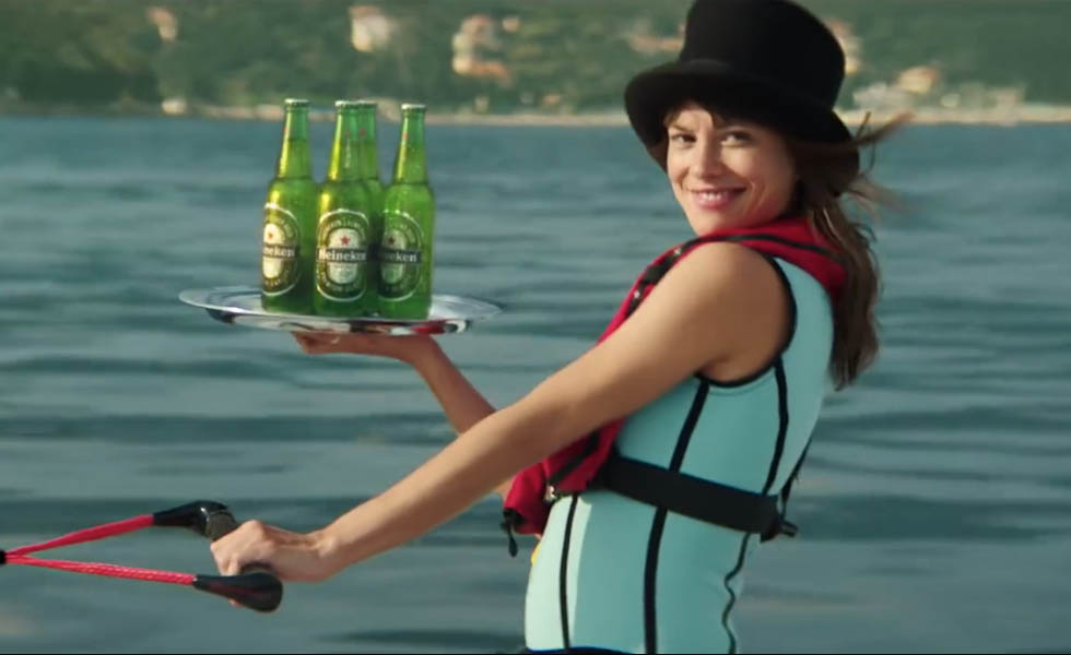 Heineken's ad to promote the latest James Bond film Spectre aims to promote more diversity and sees Bond saved by a woman.
